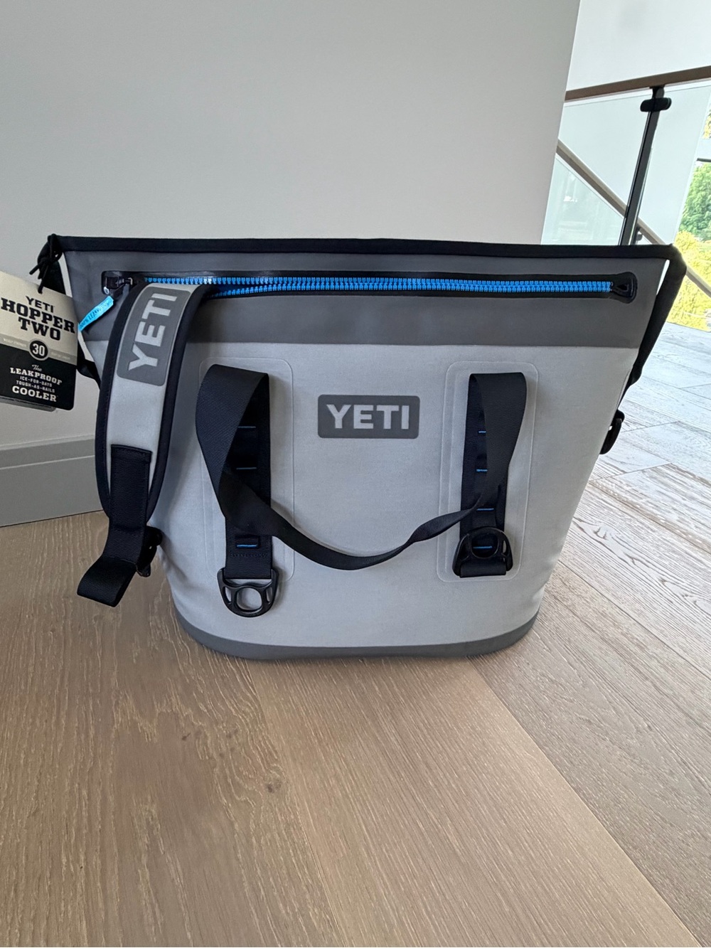 Yeti Gray Soft Duffel Cooler with Black Trim and Blue Zipper
